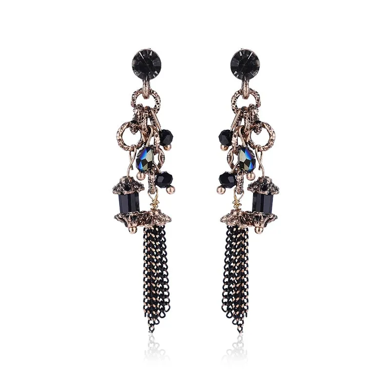 Metal dangle earrings blue stone