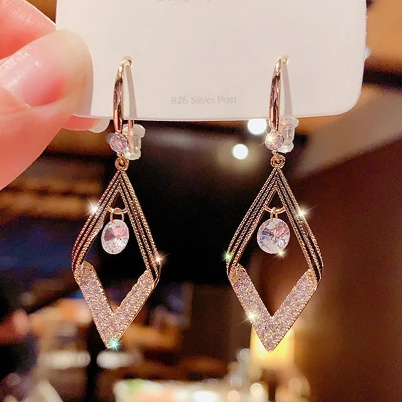Oversized Owl Drop Earrings with Pearl and Zircon Embellishments